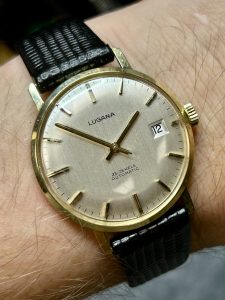 Vintage Lugana herreklokke i 14K gull