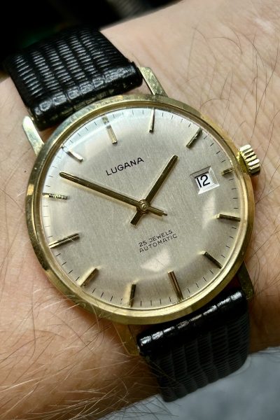 Vintage Lugana herreklokke i 14K gull